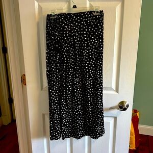Tea length wrap skirt with 2 buttons and stretch waist band in back